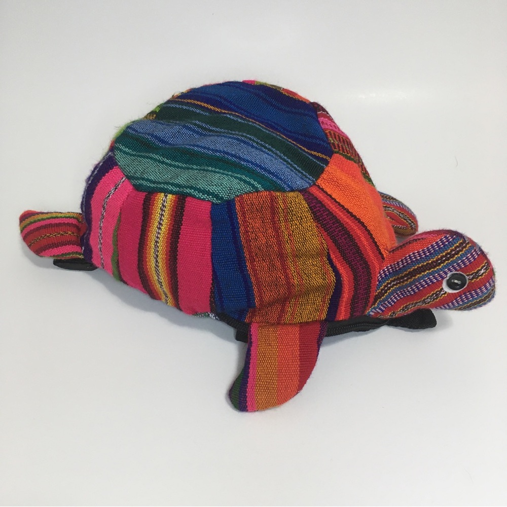 3/$30Multi coloured small turtle backpack